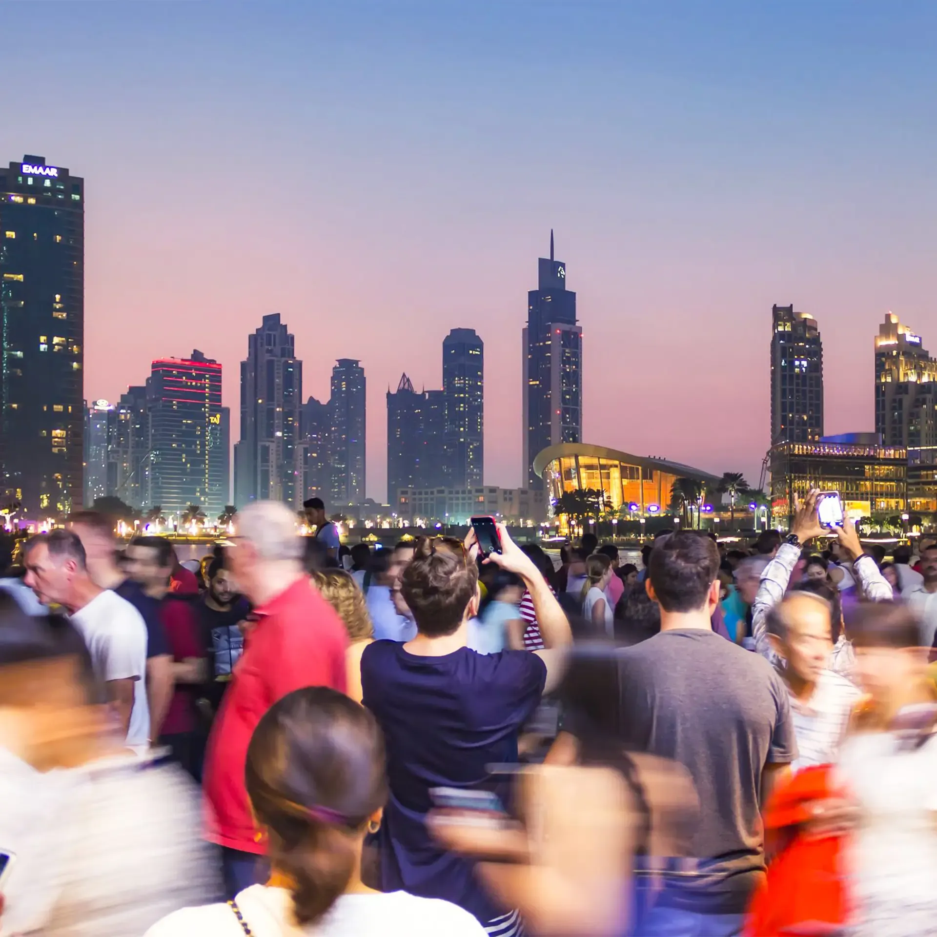 crowded scene in Dubai showing the massive population density