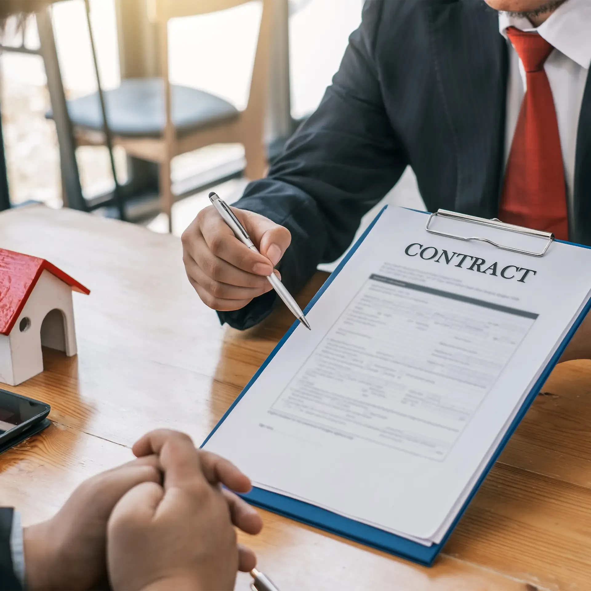 signing a Dubai tenancy contract on a desk